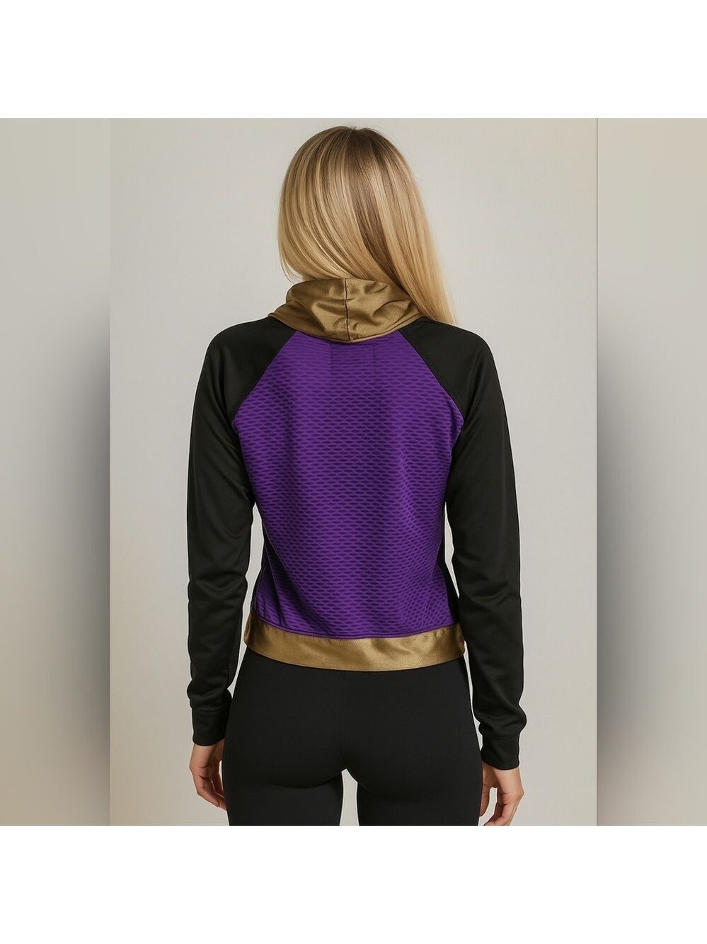 Koral Pump Energy Pullover in gold black and iris